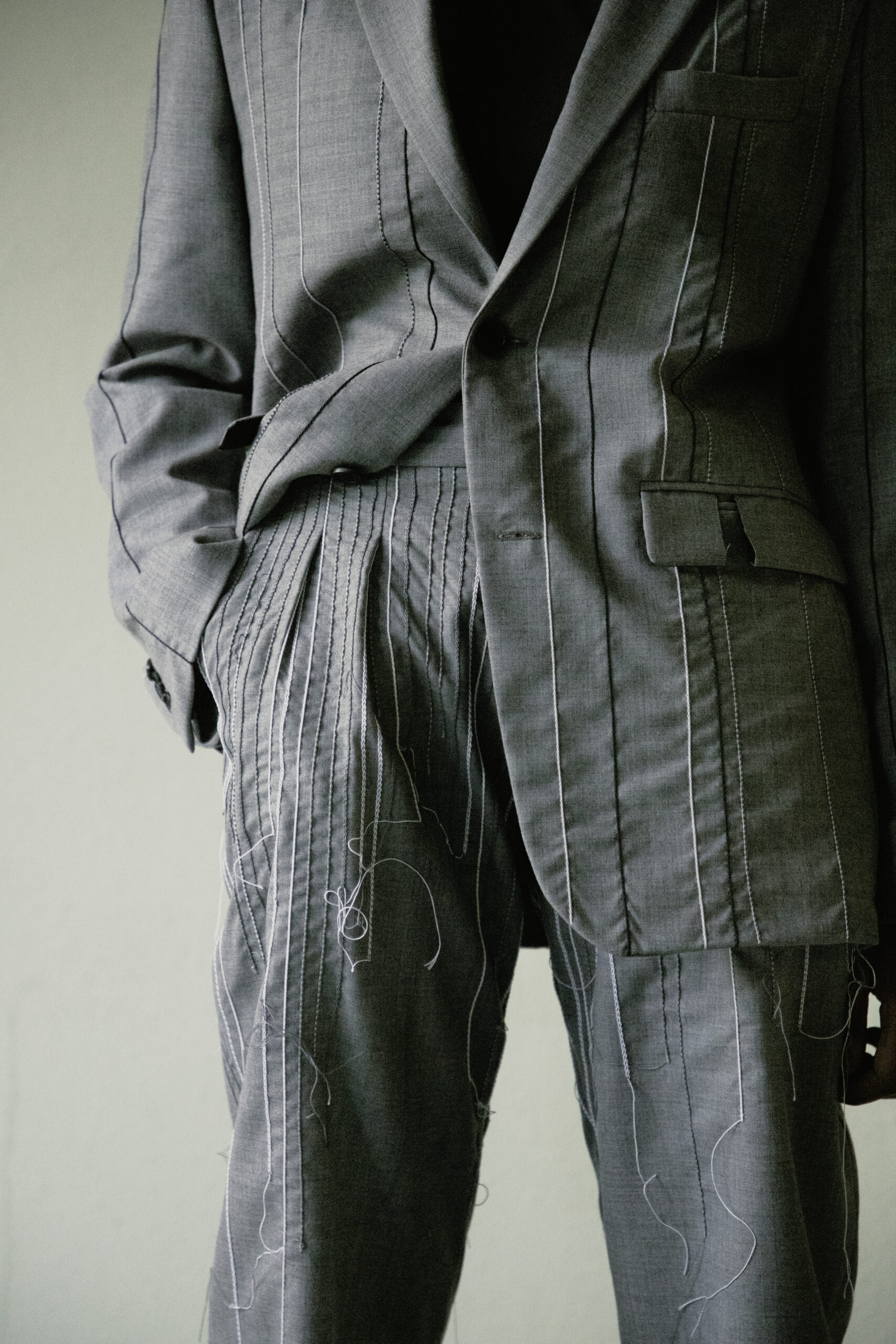 Detail light grey pinstripe suit